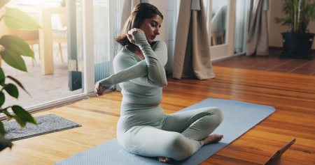 Yoga, stretching and girl with tablet for workout, healthy body and mindfulness on house floor....