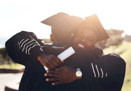 Graduation, hug and students with diploma from college for success, celebration and support in education. Certificate, happy and black men friends after achievement at graduate event at universityの写真素材
