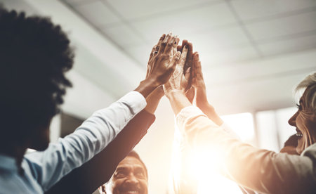 Business people, high five or hands together for success, victory or meeting for corporate support. Mission, group or partnership collaboration for teamwork, target or staff synergy for motivationの写真素材