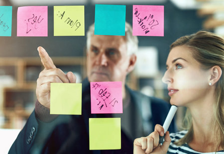 Thinking, brainstorming and business people with hand pointing in office for project, management or...