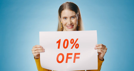 Billboard, sale and portrait of woman on blue background for news, announcement and information....