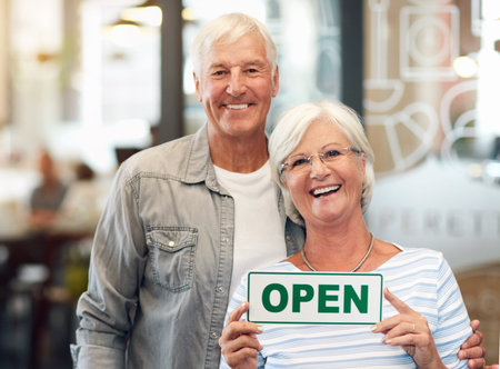 Senior couple, business and open sign portrait with happy smile from hospitality and coffee shop...