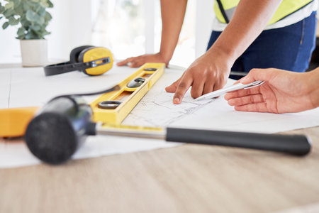 Builder, planning and blueprint of hands with tools, engineering and architecture floor plan....