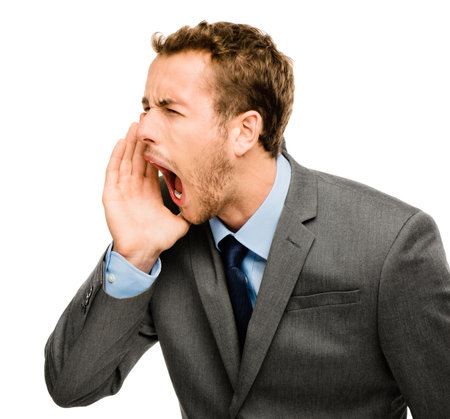 Frustrated, man and shouting from stress in studio for anxiety, mistake and psychology trauma crisis. Male person, screaming and panic attack from disaster, fail and fear on white backgroundの写真素材