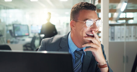 Excited, business and man on computer in office for positive feedback report on project proposal as...