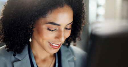 Woman, working and computer at office with business research for audit at company with smile....