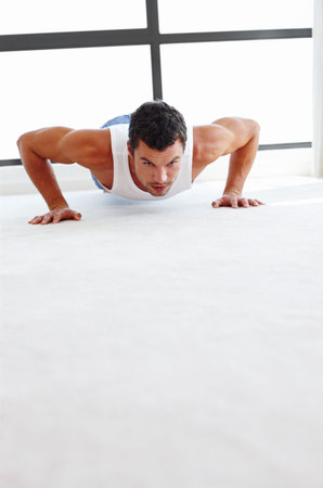 Fitness, push up and man in home for exercise, training and workout in living room. Health, mockup...