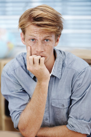 Portrait, thinking and serious or man in office as designer for ideas, information and planning for...