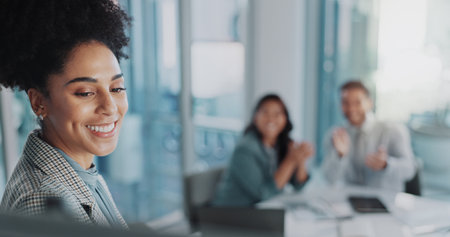 Woman, business and colleagues with presentation in office, company leader with collaboration for pitch. Female person, smile or workplace planning in sales meeting, teamwork or applause for reviewの写真素材