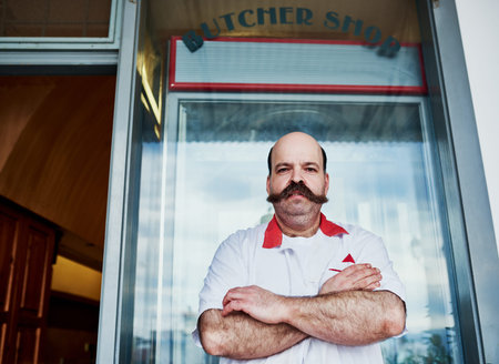 Portrait, man and butcher at store with arms crossed at small business startup. Worker, confidence...