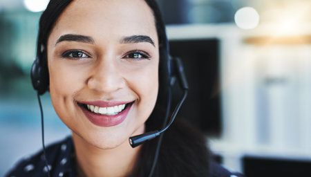 Woman, portrait and happy in call center with headset for customer service, crm and help or...