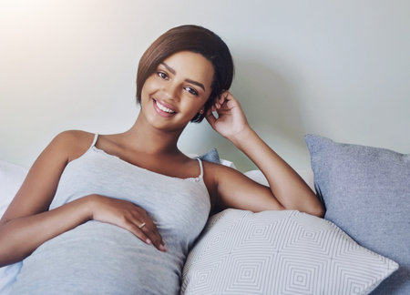 Portrait, bedroom and relax with pregnant woman, smile and fertility with rest, ivf or development....