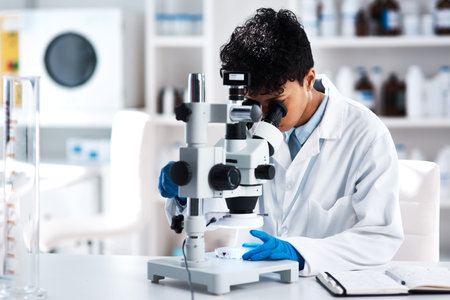 Woman, scientist and microscope for research, test or biology analysis in laboratory experiment....