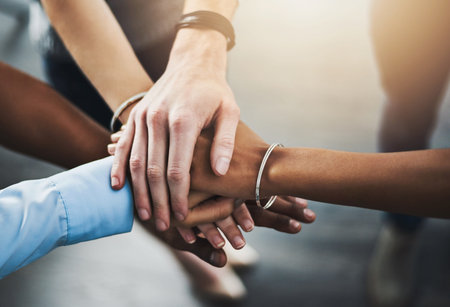 Business, people and hand stack in office teamwork, meeting and motivation with corporate employees....