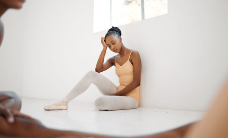 Ballet school, sad and class with girl on floor for practice, pressure and performance anxiety....