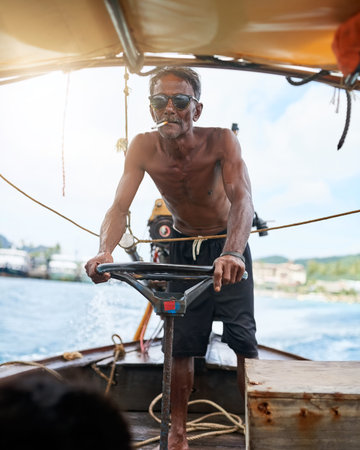 Man, sailing and steering wheel in boat, ocean and captain for navigation, transport or travel....
