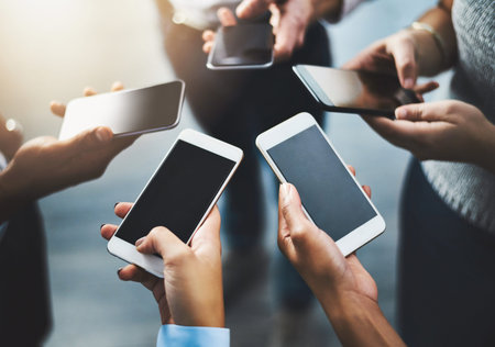 Hands, group and cellphone for new, online and screen of mockup, typing and research of competition....