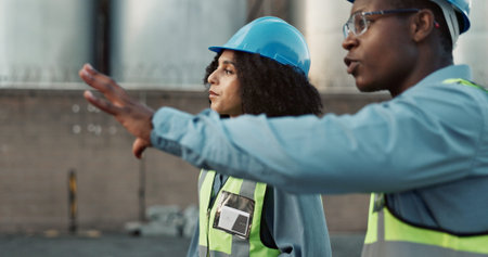 Construction worker, team and discussion with strategy at logistics site in morning for inspection...