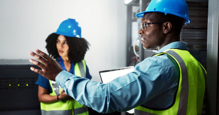 Team, engineer and hardware maintenance in server room for system inspection, update or network on...