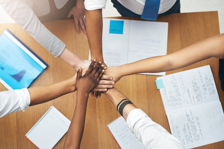 Hands, huddle and group in office with teamwork for unity with goal in work with collaboration in...