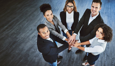Teamwork, office and above portrait of business people for solidarity, collaboration and hands...