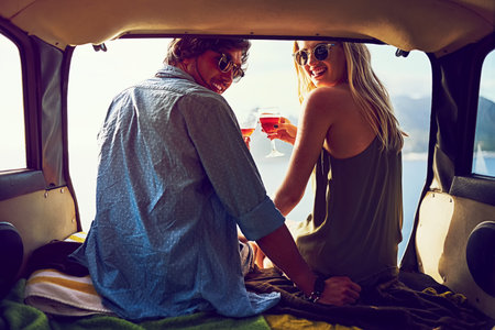 Travel, couple and car for cheers and wine, boot and happy in vehicle for road trip and vacation....
