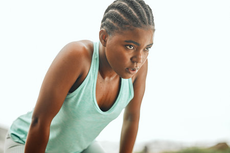 Fitness, thinking or tired black woman breathing in nature with exercise burnout, challenge or body performance. Sports, pause or sweaty girl runner outdoor with training resilience, break or mindsetの写真素材