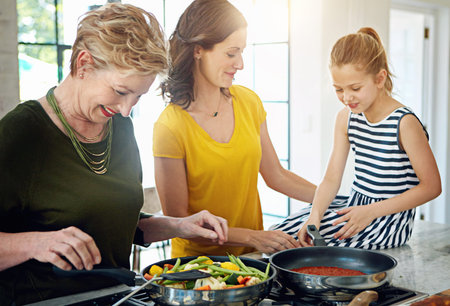 Grandmother, love or cooking by girl with mother in kitchen for learning, care or bonding at home....