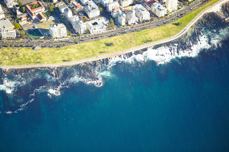 Aerial view, city and nature of ocean, location and destination for vacation, explore and travel....