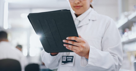 Woman, scientist and lab with tablet for medical research with test report, review and results....