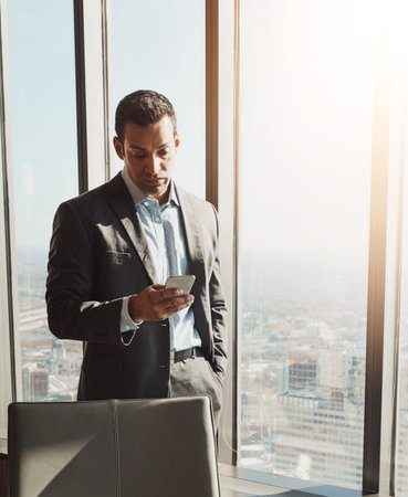 Office, corporate and business man with phone for communication, contact and b2b networking....
