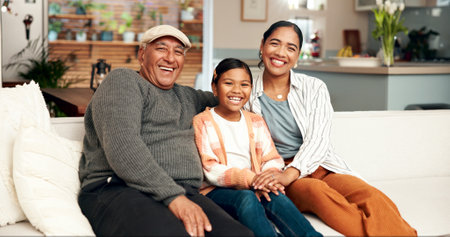 Portrait, family and smile for generations on couch for bonding, support and relationship for childhood memory. Happy, grandparent and woman with child for care, fun and love together at house loungeの写真素材