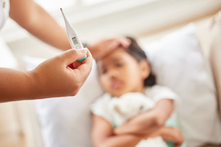Girl, hand and thermometer for test in home, sick and virus or monitor temperature in bedroom....