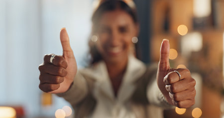 Woman, thumbs up and happiness for good news, positive feedback or successful application in home....