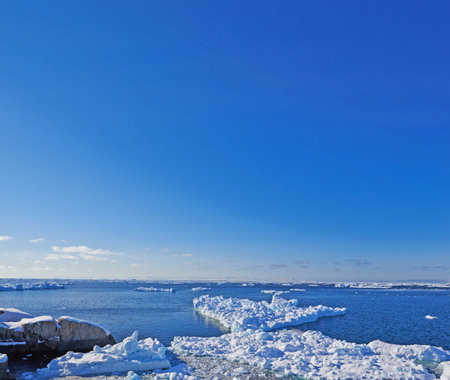 Antarctica, frozen and sky with ice in ocean for cold ecosystem of environment in winter season....