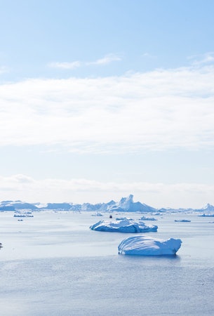Antarctica, sky and water with ice in ocean for cold ecosystem of environment in winter season....