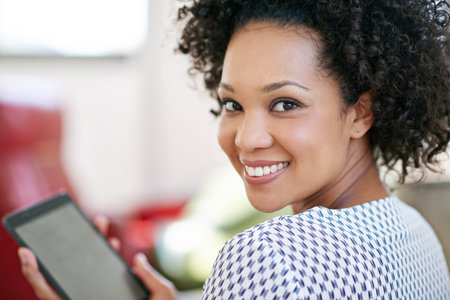 African woman, home and tablet in portrait for communication, scroll or online dating. Female...