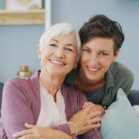 Senior woman, daughter and portrait in apartment with hug for family, love and support for...