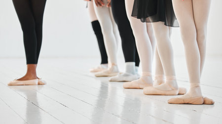 People, ballet and group of legs with teacher for performance art, balance and learning of recital. Dance school, class and feet with practice on floor in routine for elegance, skill and talentの写真素材