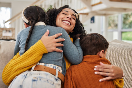 Portrait, mom and kids with hug on sofa for gratitude, appreciation or safety in family at home. Love, woman and happy with affection of children in living room for motherhood, connection and supportの写真素材