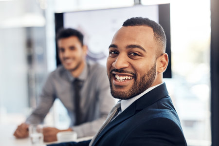 Boardroom, portrait and corporate man in meeting, business training and workshop for project feedback. Office, coworker or male consultant with smile for company, professional growth and confidentの写真素材