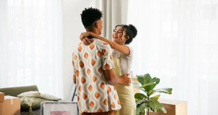 Couple, dancing and happy in new home with people, moving and celebrating mortgage for relationship...
