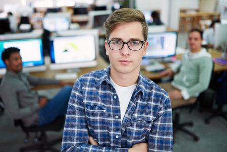Man, confident and serious in office for portrait, creative agency and web design career in start up...