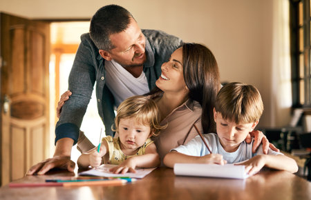 Family, education and homework with kids, drawing and notepad with parents teaching for learning....