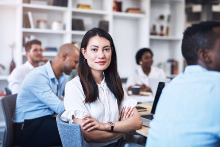 Businesswoman, portrait or arms crossed in meeting for confidence, teamwork or collaboration in...