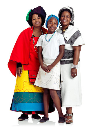 African family, fashion and kid portrait in studio, proud heritage and tradition on white background. Parents, lgbtq couple and teenager daughter for culture bonding, confident and love for supportの写真素材