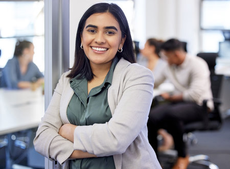 Business woman, portrait and meeting at table for planning, collaboration and communication. Happy employee, entrepreneur and strategy for company growth, brainstorming and teamwork with peopleの写真素材