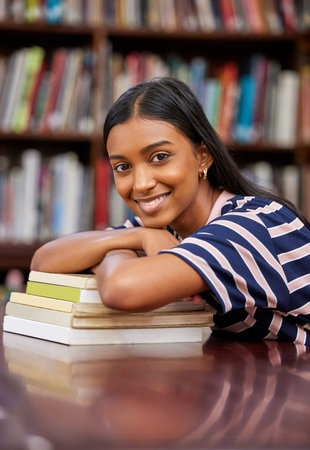 Student, library and books with portrait of woman with textbook for knowledge, education and study...