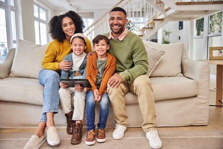 Portrait, happy family and tablet on couch with mom, dad and kids in lounge for streaming movies. People, tech and house for educational games, learning and childhood development as parents in homeの写真素材
