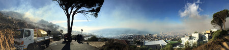 Nature, mountain and countryside with smoke or risk of climate change, danger in environment with...